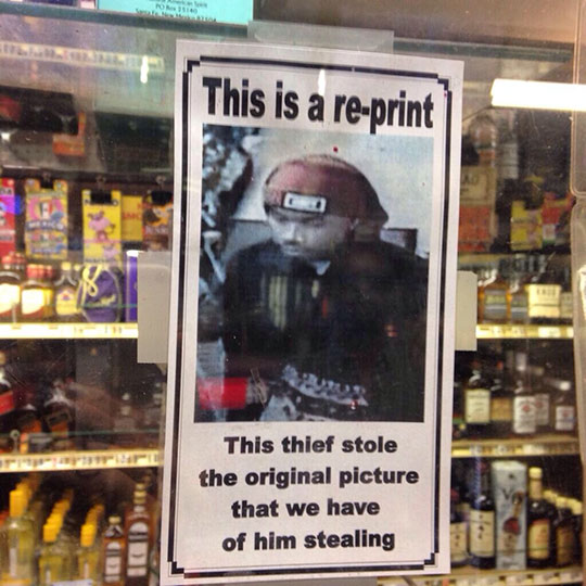 funny-thief-stolen-picture-store