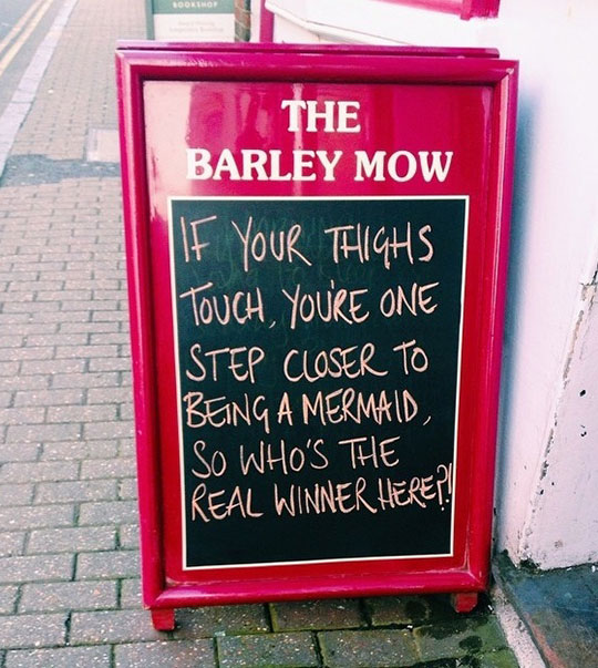 funny-restaurant-sign-thighs-mermaid