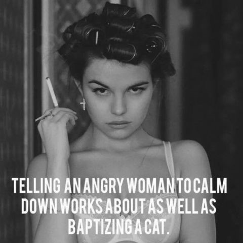 angry-woman-cal-babtizing-cat