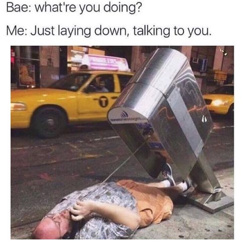 phone-street-man-laying